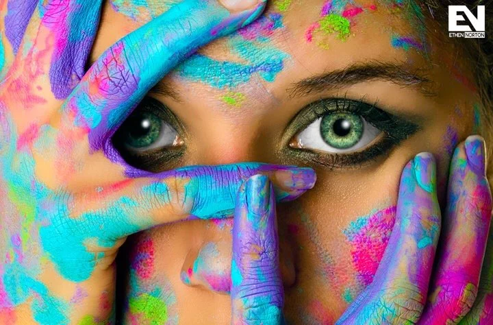Portrait painted in vivid blue, pink, and purple color